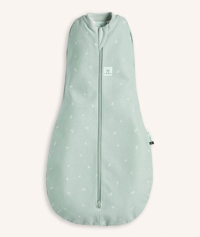 Cute Cocoon Swaddle Bag Sage (3-6m) in a baby pink background