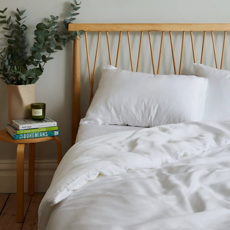 The Eucalyptus Pillow Case Set - White Aeyla on a bed