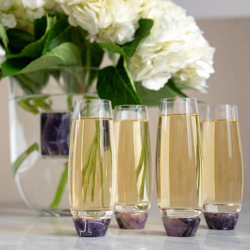 Drinks served in Luxurious glasses on a table with flowers - Elevo Glasses - Amethyst Anna New York