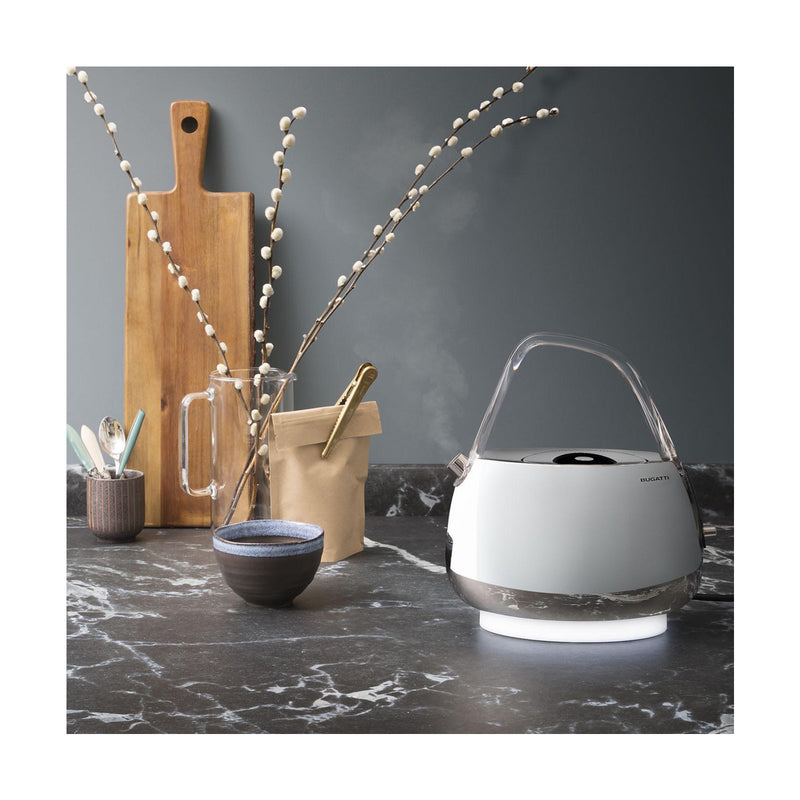 Smart Kettle with Transparent Handle on a slab with cup and chopping board - Jacque Chrome - By Casa Bugatti